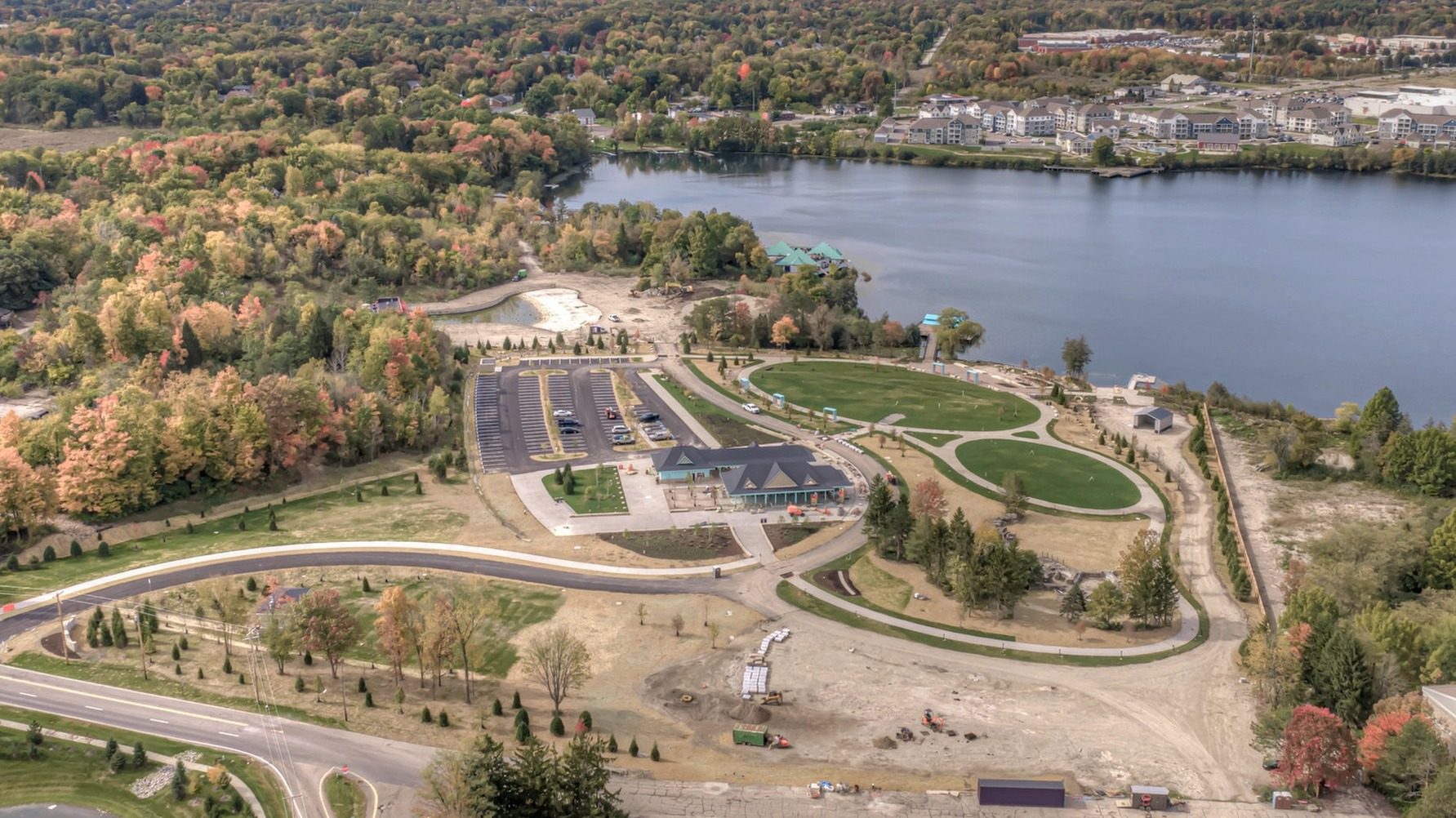Park entrance: pavilion, parking and lake, October 12, 2026